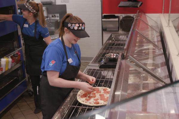 Making pizza at Domino's