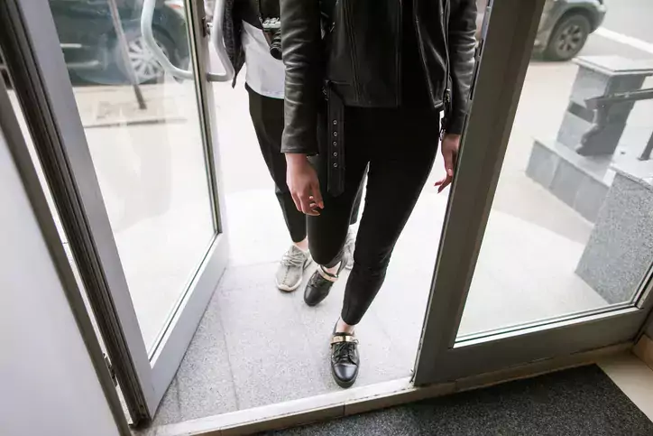 Customers coming into shop from street